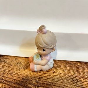 Precious Moments baby figurine
